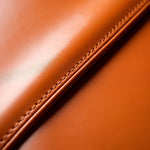 Pouf Coffre Cuir Orange – Le Vault