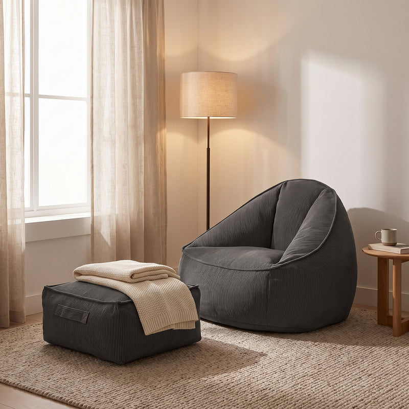 Pouf poire gris foncé Le Still dans un coin détente